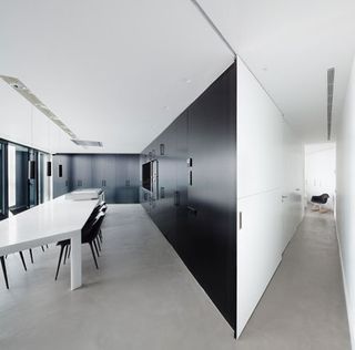 A monochrome colour palate distinguishes the interiors.