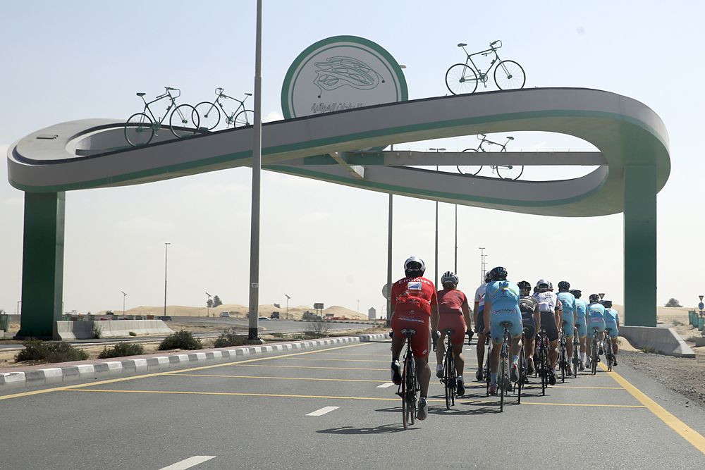 Riders shake out their legs before the team presentation