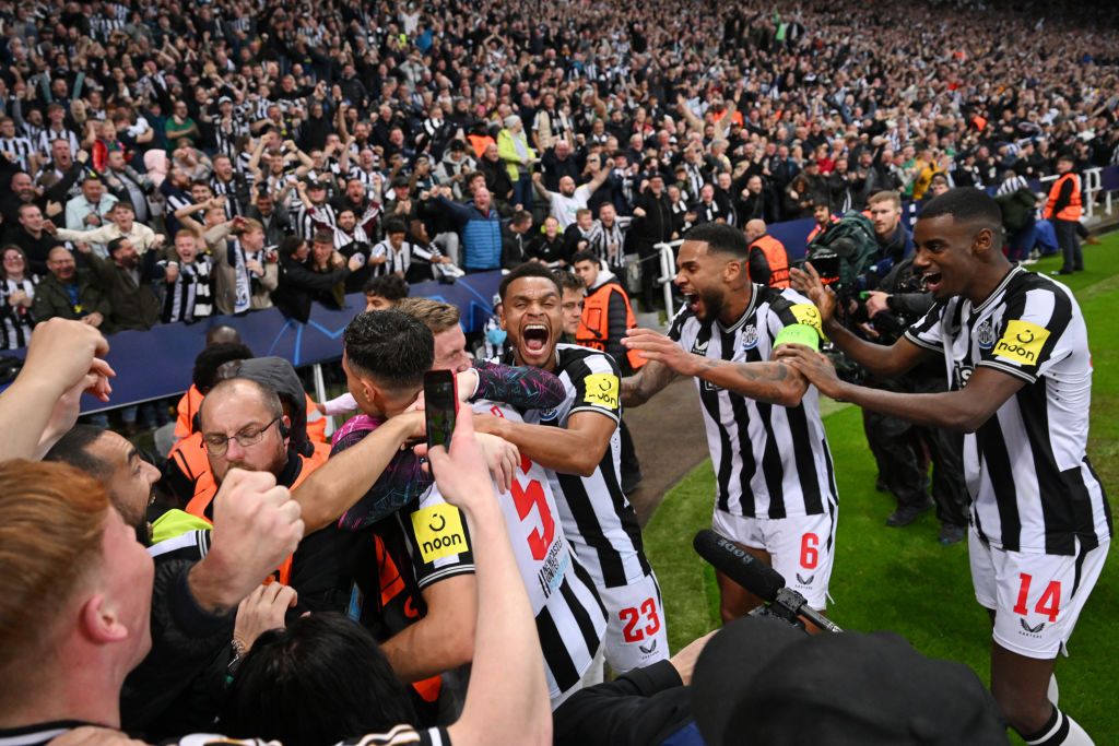 Fabian Schar of Newcastle United celebrates with teammates after scoring the team&#039;s fourth goal during the UEFA Champions League match between Newcastle United FC and Paris Saint-Germain at St. James Park on October 04, 2023 in Newcastle upon Tyne, England.