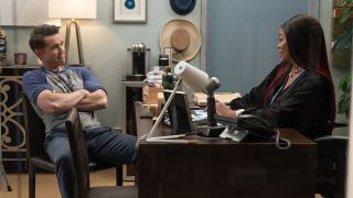 Mac sitting across the desk from Ava in It's Always Sunny in Philadelphia crossover with Abbott Elementary