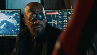 Nick Fury stares at an off-camera Spider-Man in Far From Home