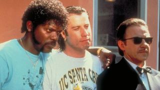 Jules, Vincent, and Winston stand in a driveway in Pulp Fiction