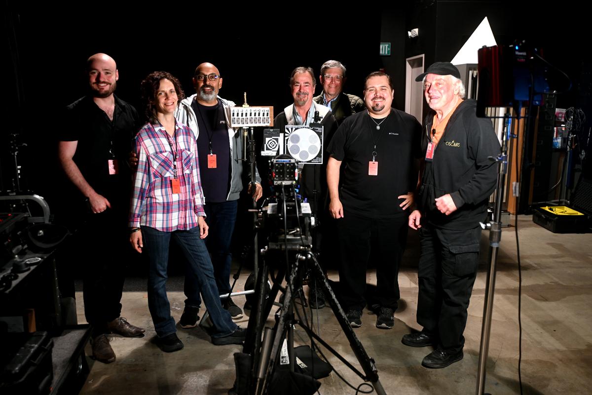 Left to Right: Valentin P. Alt, AC/DIT; Danna Kinsky, Camera Assistant; Snehal Patel, Director/Producer at FearlessProductions.tv and Committee Leader for the Camera and Lens Metadata Committee; Dave Stump, ASC BVK; Rob Hummel, Photographer; Phil Holland, Cinematographer/Image Scientist; and Joe di Gennaro, Stage.