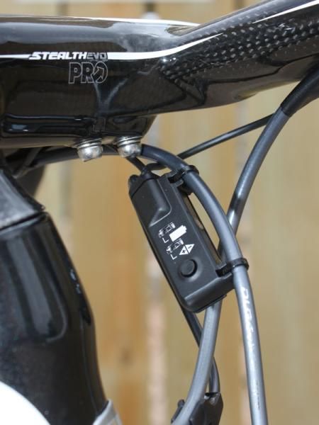 This control box replaces the usual barrel adjusters on Shimano's Dura-Ace Di2 group.