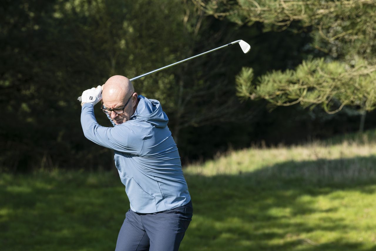The stretchy Peter Millar Flex Adapt Half Zip hoodie