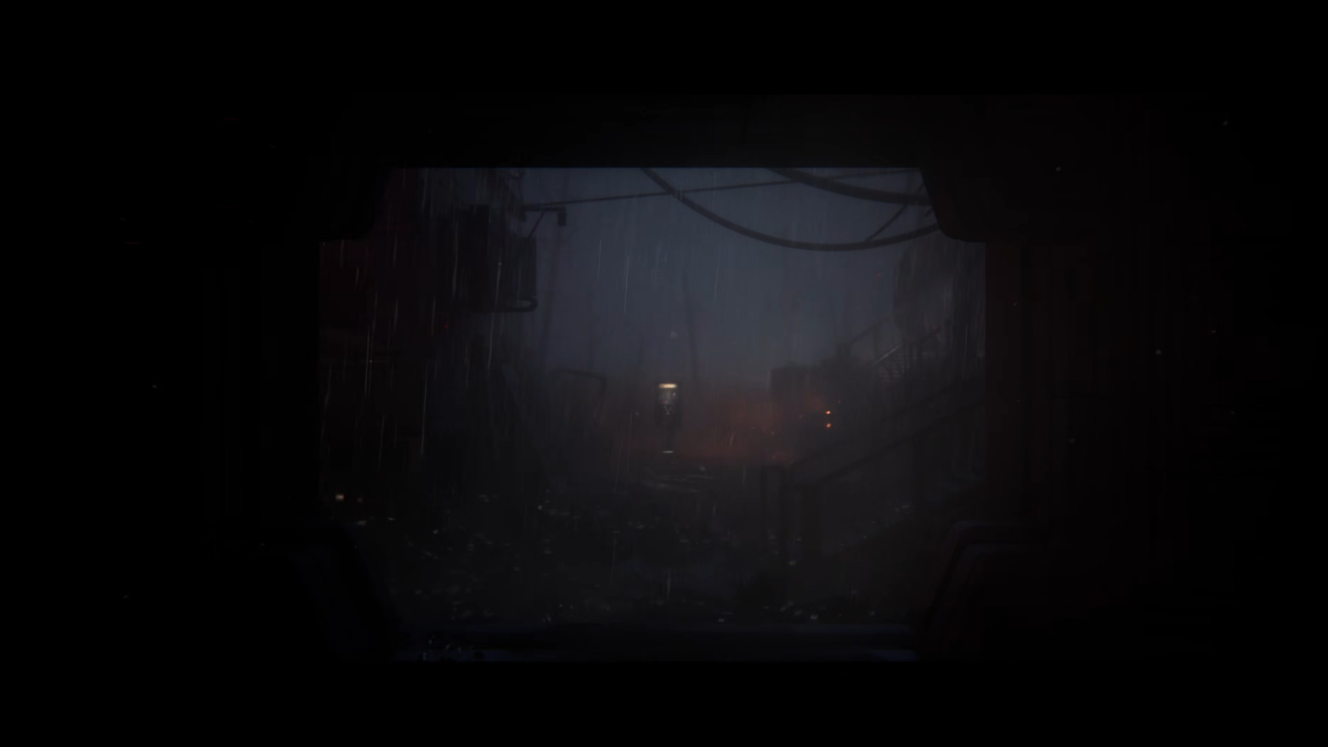 A shot of a ruined colony at night in the rain during the teaser for the game Alien: Isolation 2