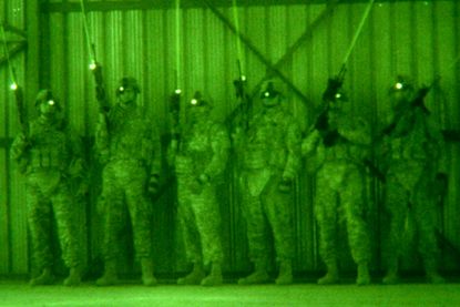U.S. soldiers train with infrared lasers in 2009. 