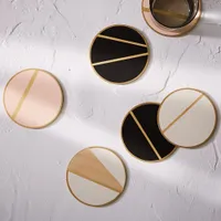 15. The Vintage Vogue Linea coasters | $29 at West Elm