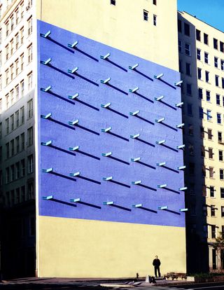 Forrest Myers beside his original work, The Wall (1973), SoHo, New York