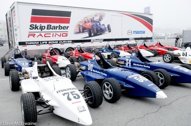Road racing cars were lined up near the short track racing