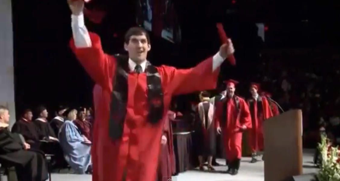 Davenport graduate face-plants on stage after attempting a backflip