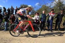 SIENA ITALY MARCH 02 Quinn Simmons of The United States and Team Lidl Trek competes while fans cheer during the 18th Strade Bianche 2024 Mens Elite a 215km one day race from Siena to Siena 320m UCIWT on March 02 2024 in Siena Italy Photo by Tim de WaeleGetty Images