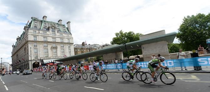 The peloton rides past the Ritz in London