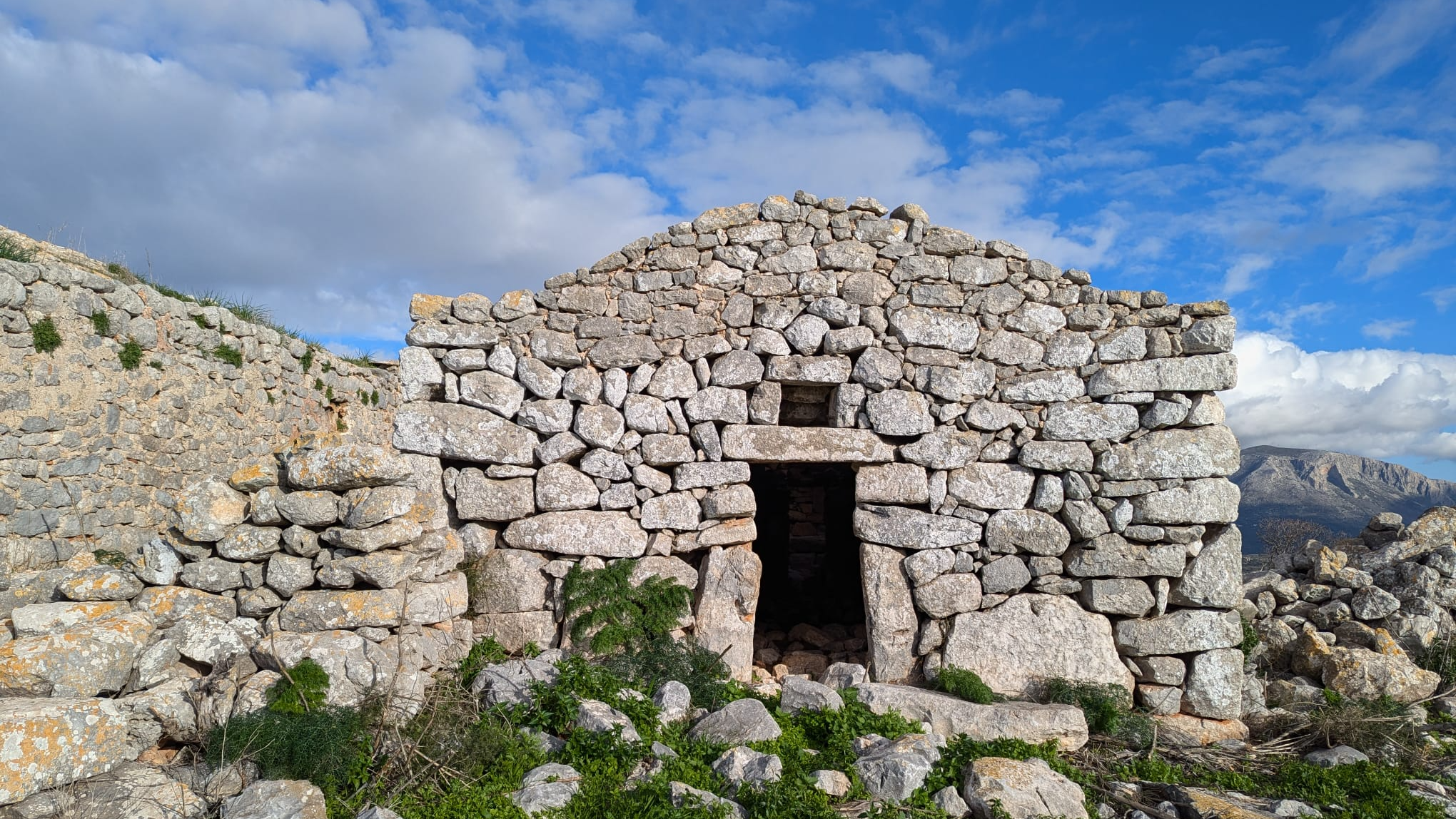a building made with stacked stones