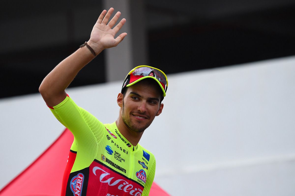 Luca Pacioni (Wilier Triestina-Selle Italia) waves from the podium