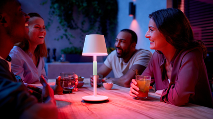 friends round table with Phillips Hue Lighting 