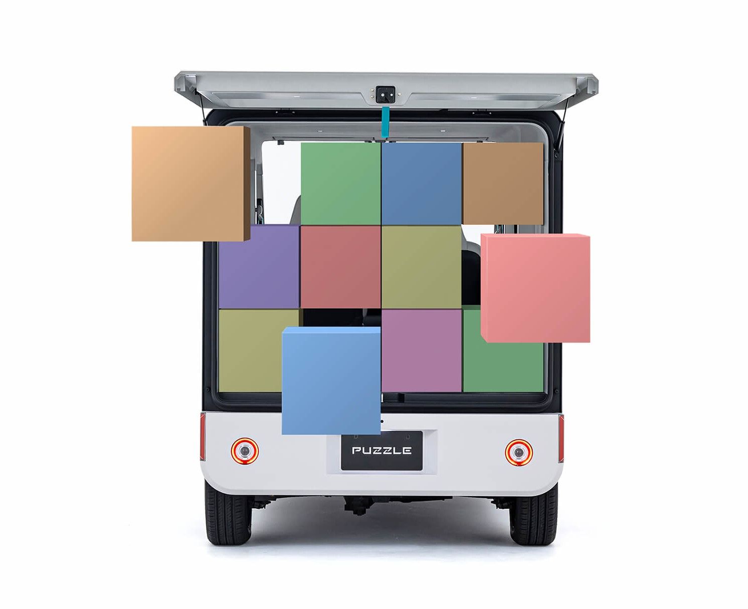 colourful boxes inside Puzzle electric delivery van
