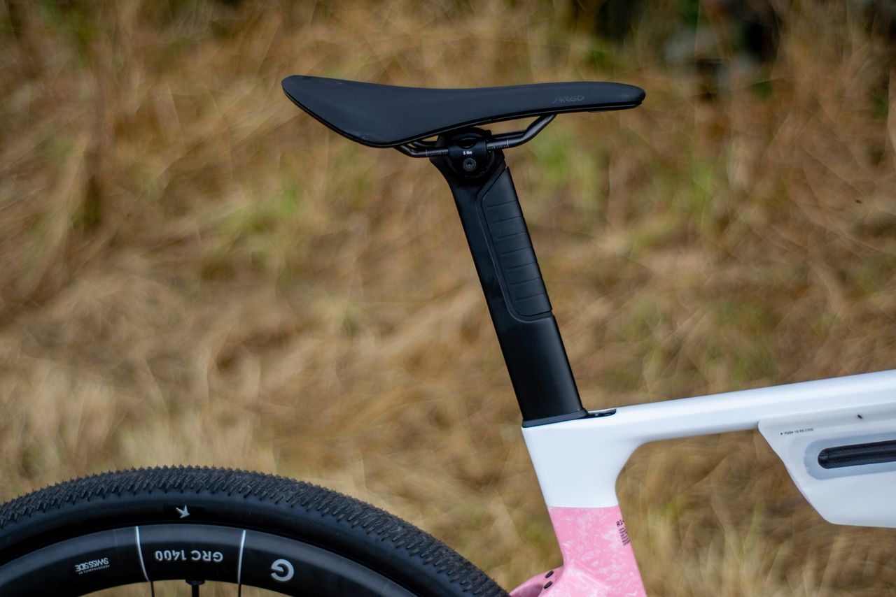 A Canyon Grail CF SLX 8 in the 'strawberry shake' colour