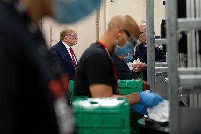 Trump at a mask factory