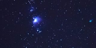 Astrophotographer Chris Bakley of Cape May, New Jersey, made a double exposure to create this view of both Comet Lovejoy and Orion Nebula on Jan. 7, 2015.
