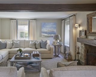 A cozy living room idea with neutral furniture and pale blue accents.