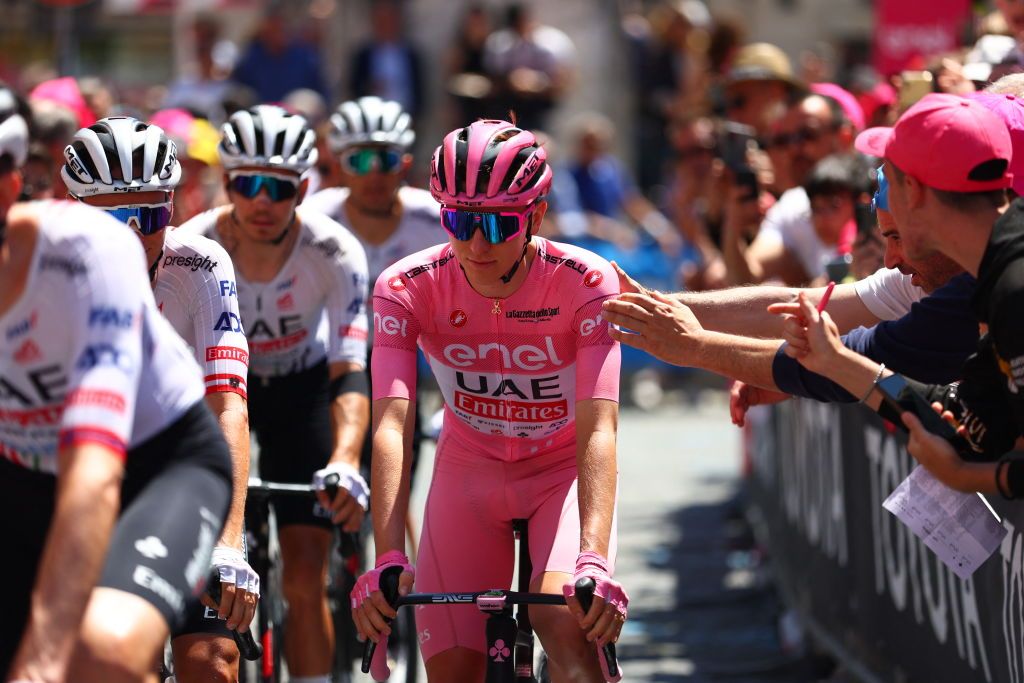 Team UAE's Slovenian rider Tadej Pogacar goes to the start of the 8th stage of the 107th Giro d'Italia cycling race, 152km between Spoleto and Prati di Tivo, on May 11, 2024 in Spoleto. (Photo by Luca Bettini / AFP)