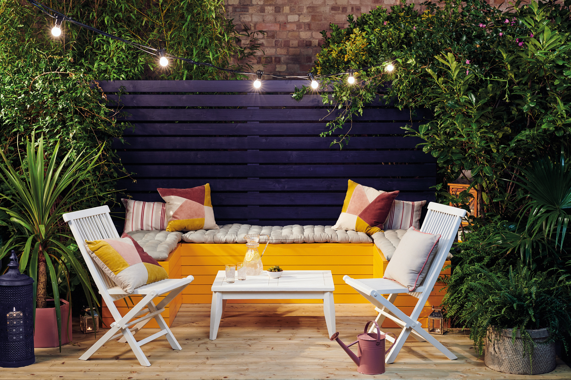 bench and seating area upcycled with mustard and rust tones from Farrow & Ball