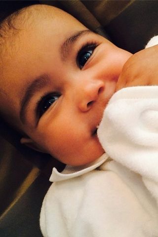 North West Bats Her Long Baby Lashes