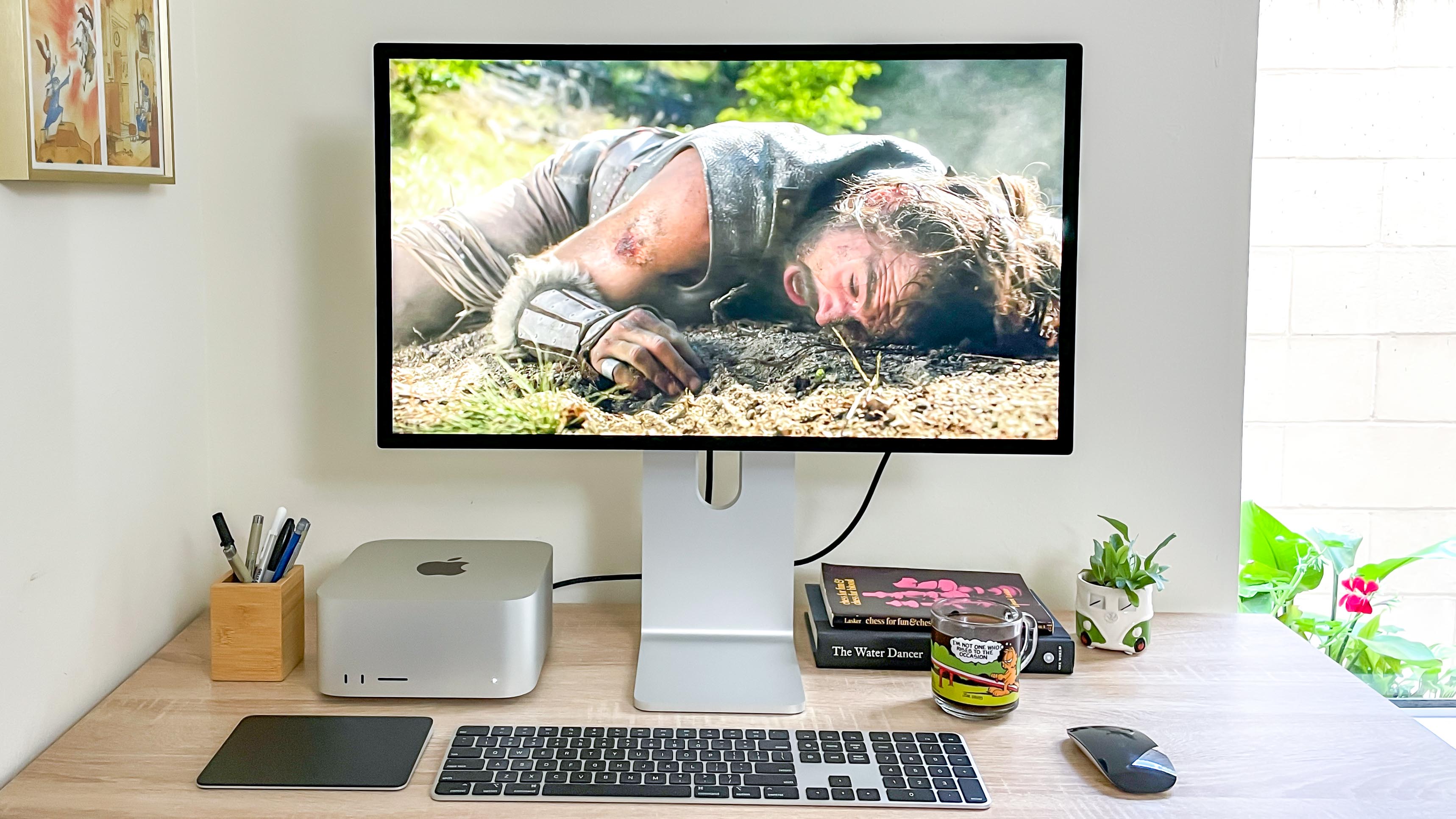 Apple Studio Display showing Wheel of Time playing