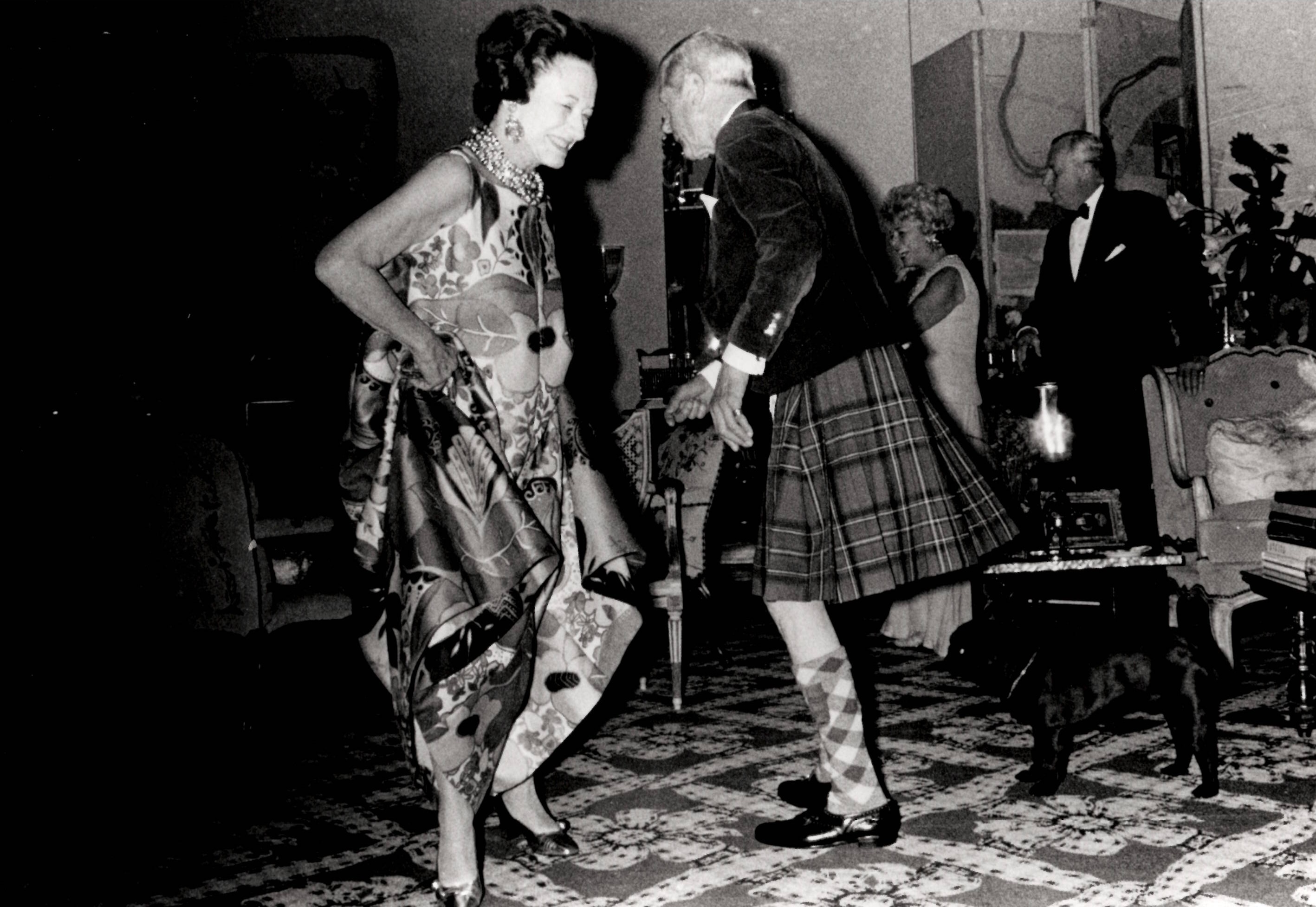 The Duchess and Duke of Windsor dancing a reel in tartan