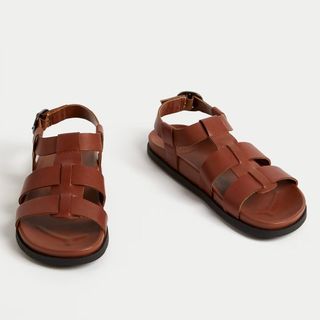 flat lay image of brown sandals