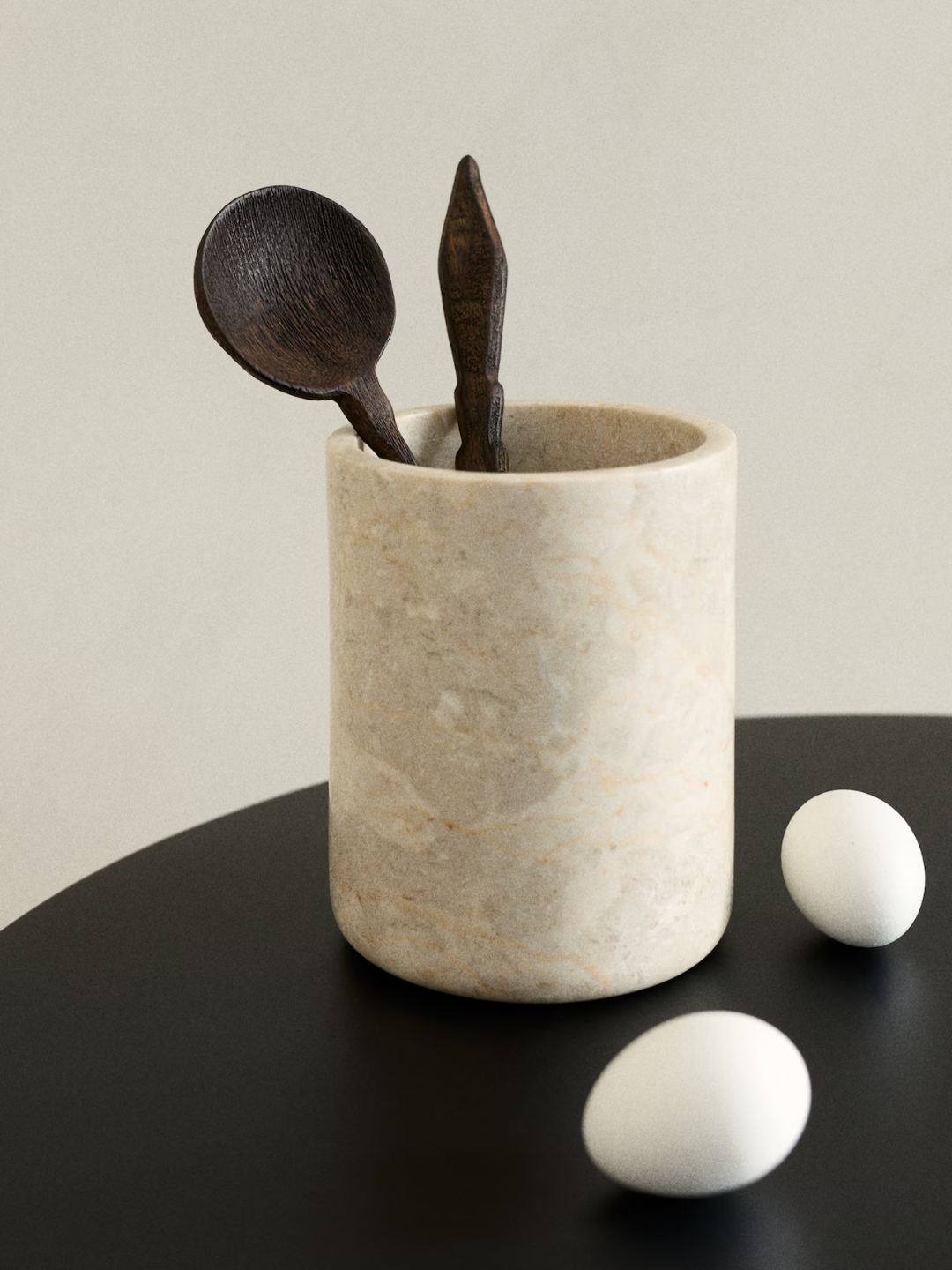 A beige marble utensil holder from H&amp;amp;M
