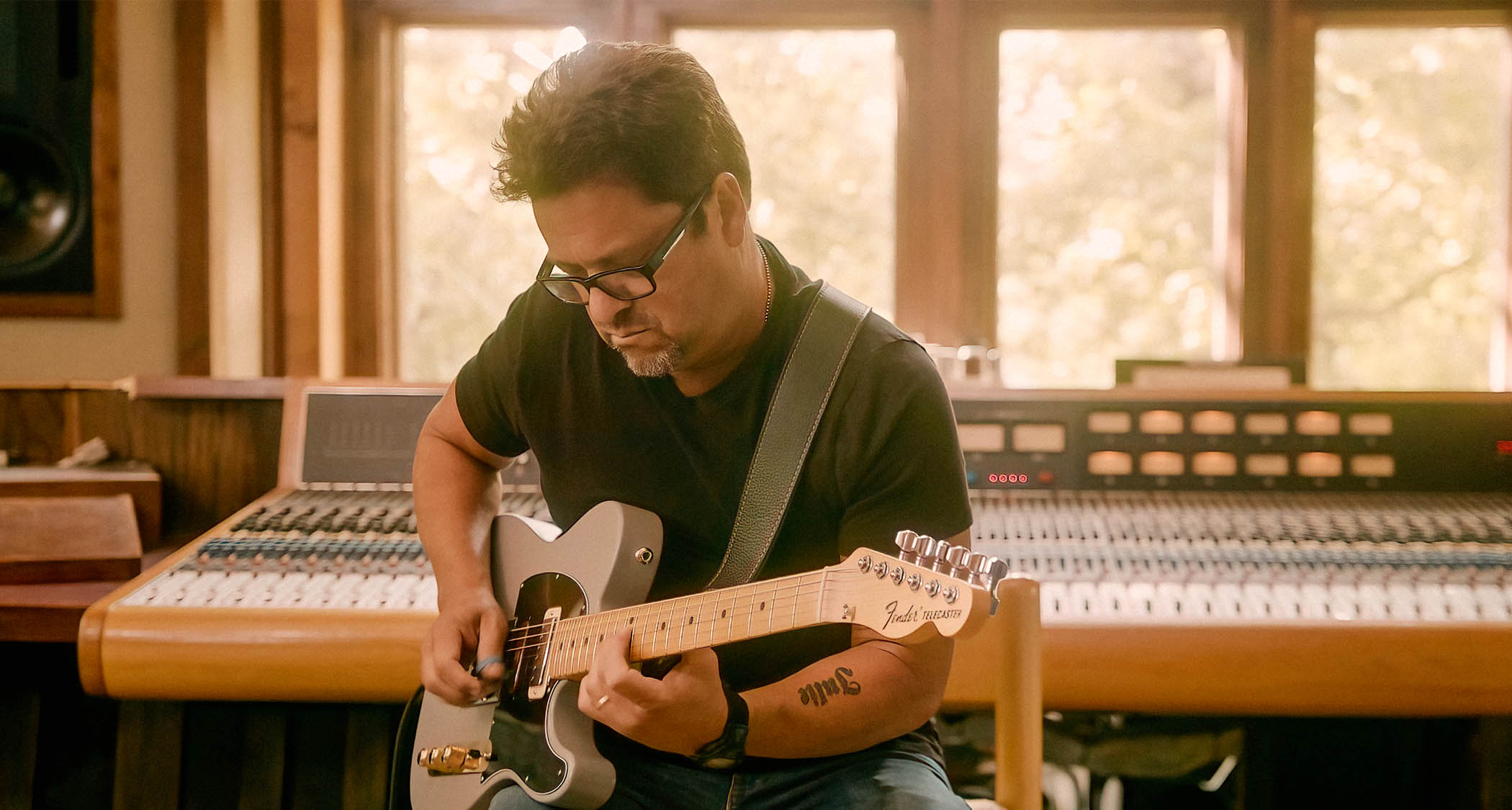 Studio ace Brent Mason with his Primer Gray signature Fender Telecaster, a heavily modded electric that can cover all bases.