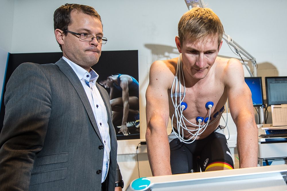 Professor Bert op 't Eijnde of Hasselt University watches Andre Greipel during medical tests in Diepenbeek, Belgium