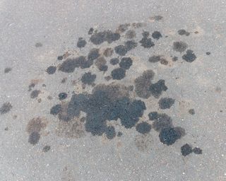 oil stains on driveway