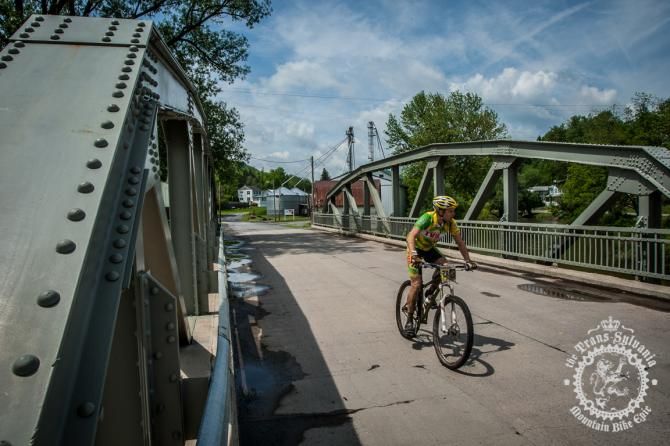 Scott Smith hits a bridge through the scenic town of Coburn, PA