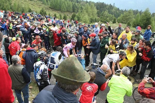 The tifosi on the Mortirolo were stacked ten deep as the pink jersey passed.