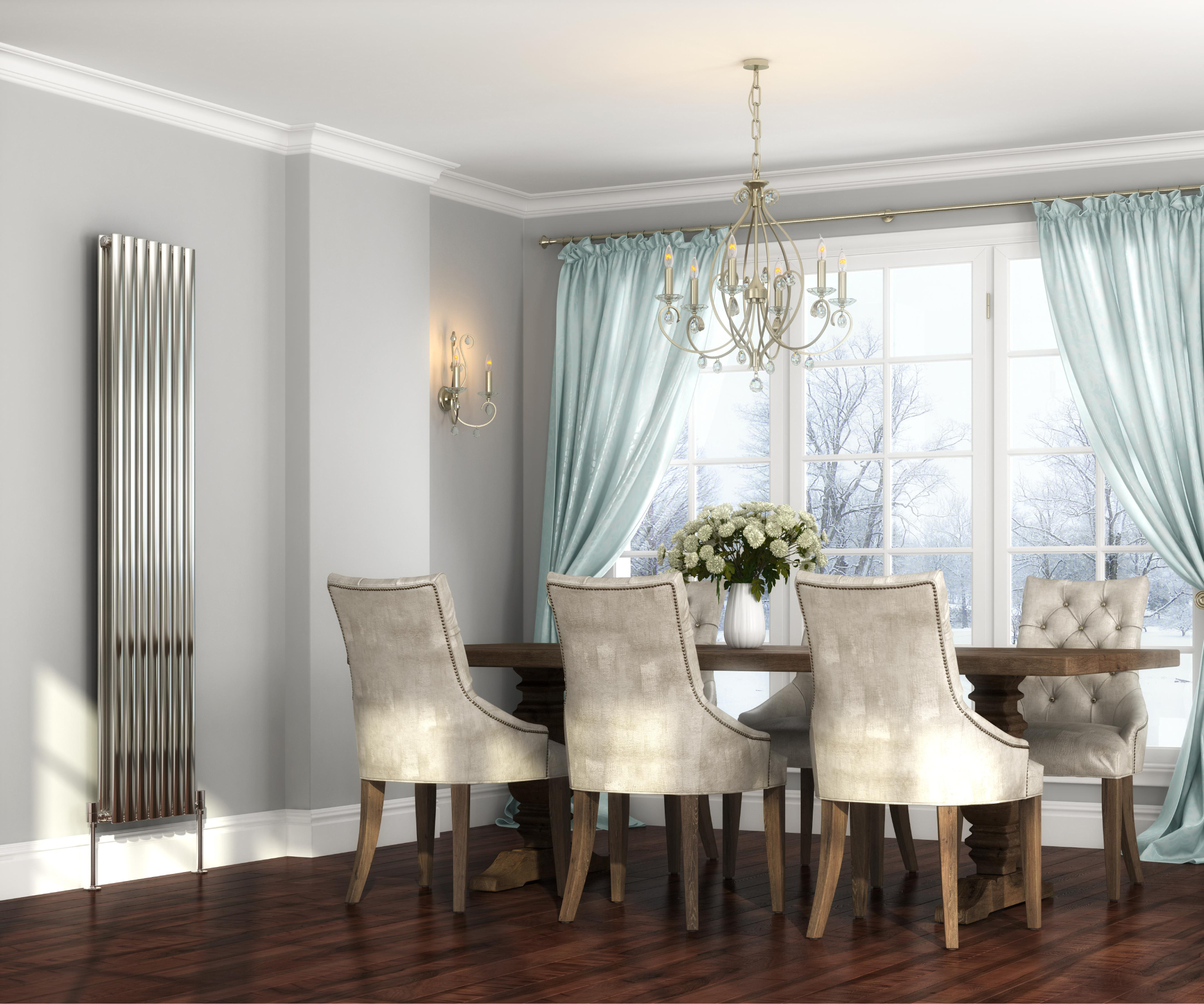 dining room with chrome vertical radiator, dark wooden floor, chandelier, wooden oval dining table and 6 cream upholstered chairs, blue curtains at window