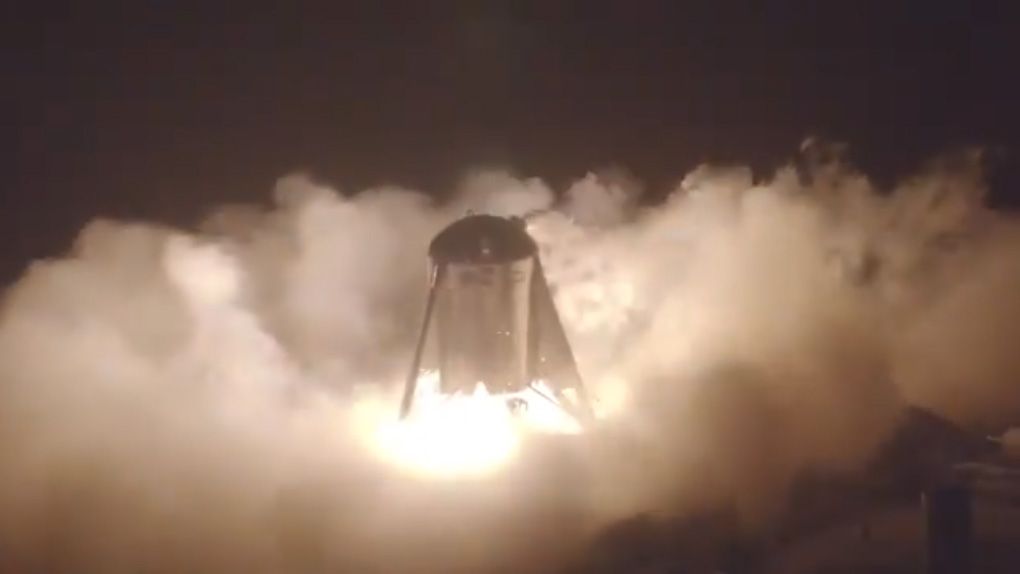 SpaceX&#039;s Starhopper Starship prototype makes its first untethered flight at the company&#039;s Boca Chica test site in South Texas on July 25, 2019 in this still from a drone camera.