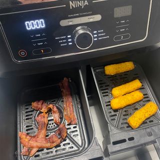 Image of fish figners and bacon in air fryer