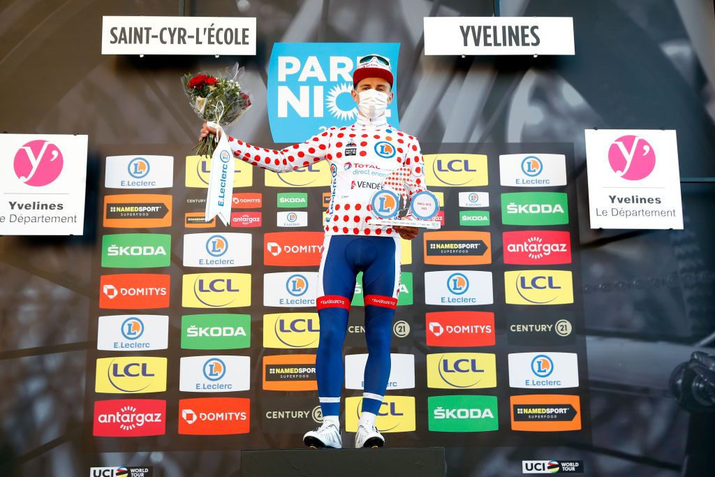 SAINTCYRLECOLE FRANCE MARCH 07 Podium Fabien Doubey of France and Team Total Direct Energie Polka Dot Mountain Jersey Celebration during the 79th Paris Nice 2021 Stage 1 a 166km stage from SaintCyrlEcole to SaintCyrlEcole Mask Covid safety measures Flowers Trophy ParisNice on March 07 2021 in SaintCyrlEcole France Photo by Bas CzerwinskiGetty Images