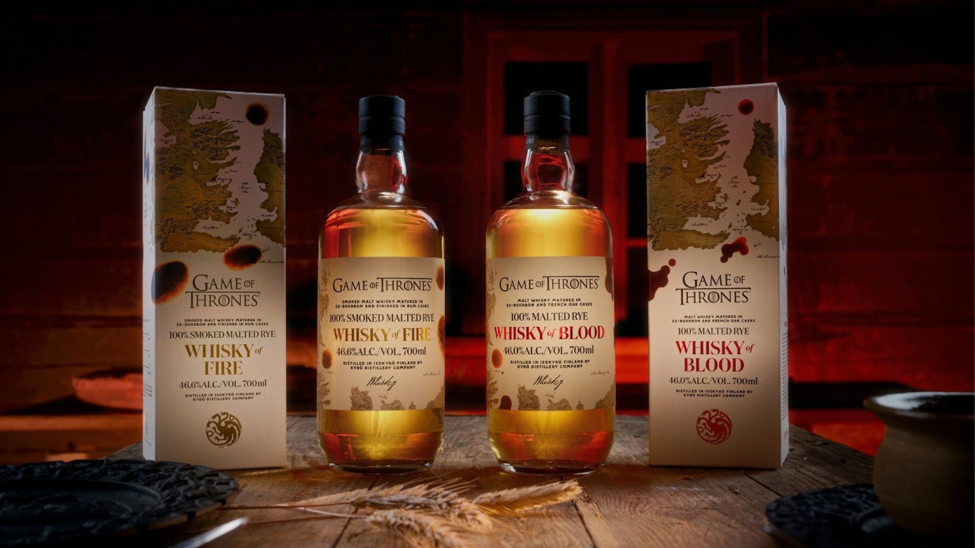 an image of the two bottles of whisky with the boxes next to them