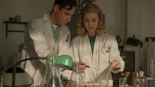 Lewis Pullman and Brie Larson in Lessons In Chemistry.