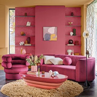 Pink sofa and wall with yellow ceiling