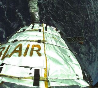 Bigelow Aerospace's Genesis II prototype habitat captured this self-portrait in Earth orbit. (Bigelow Aerospace founder Robert Bigelow had the name of his granddaughter, Blair, stitched onto the habitat's exterior.)