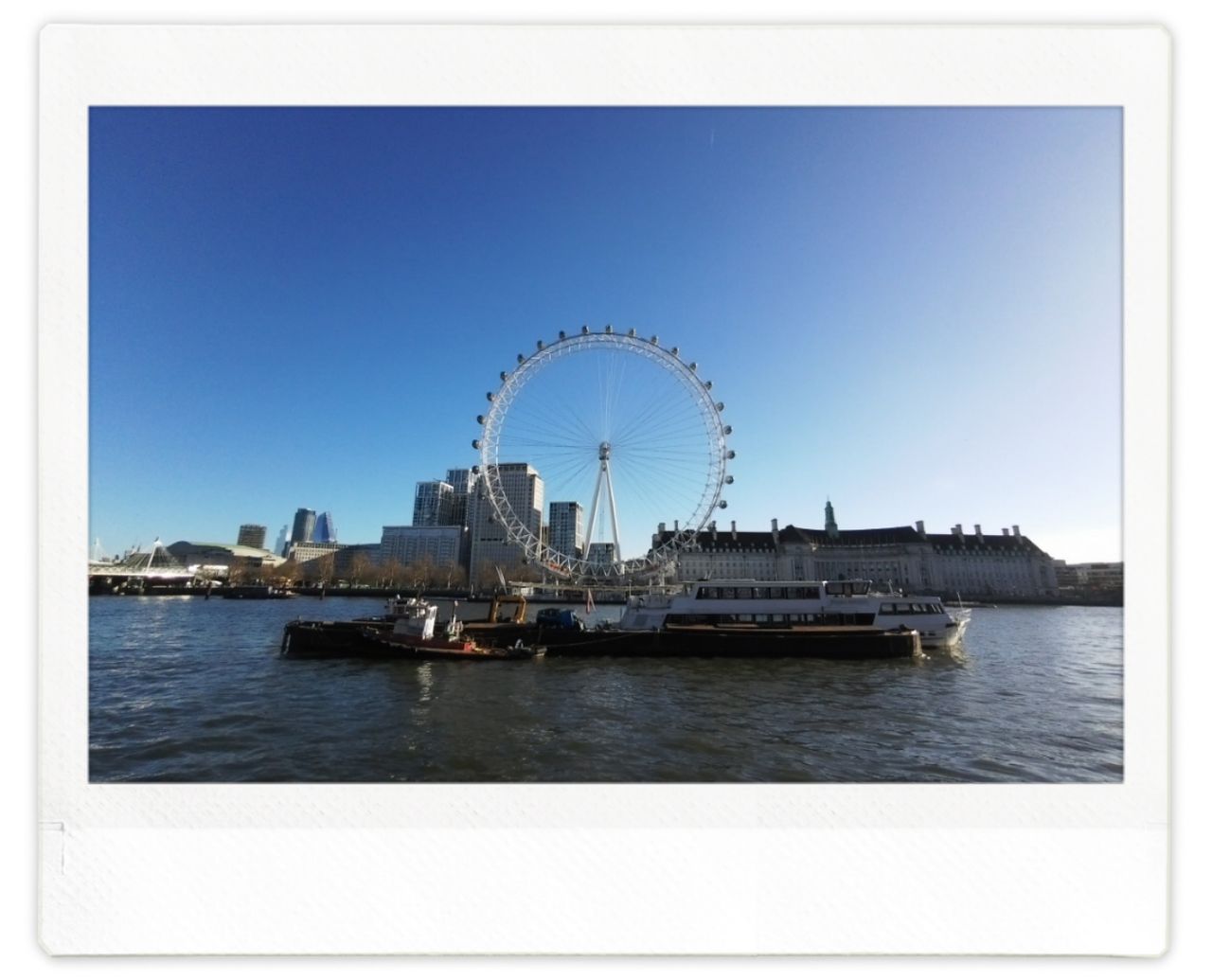 The London Eye as seen from the other side of the River Thames