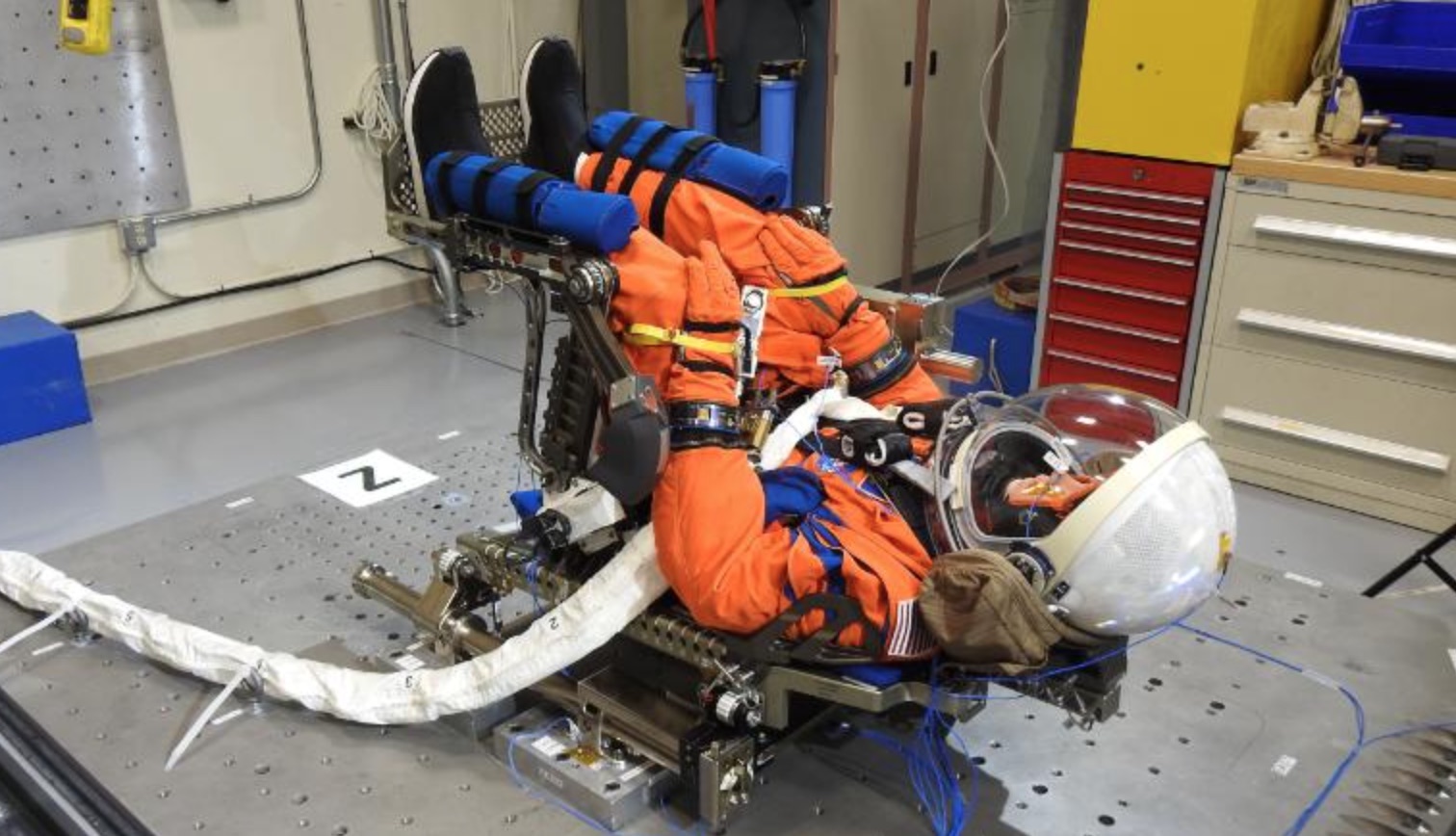 NASA's spacesuit-clad Moonikin Campos mannequin undergoing testing.