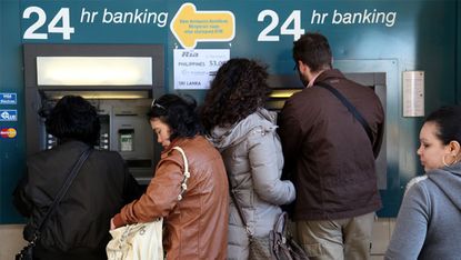 Cyprus bank levy ATM 180313