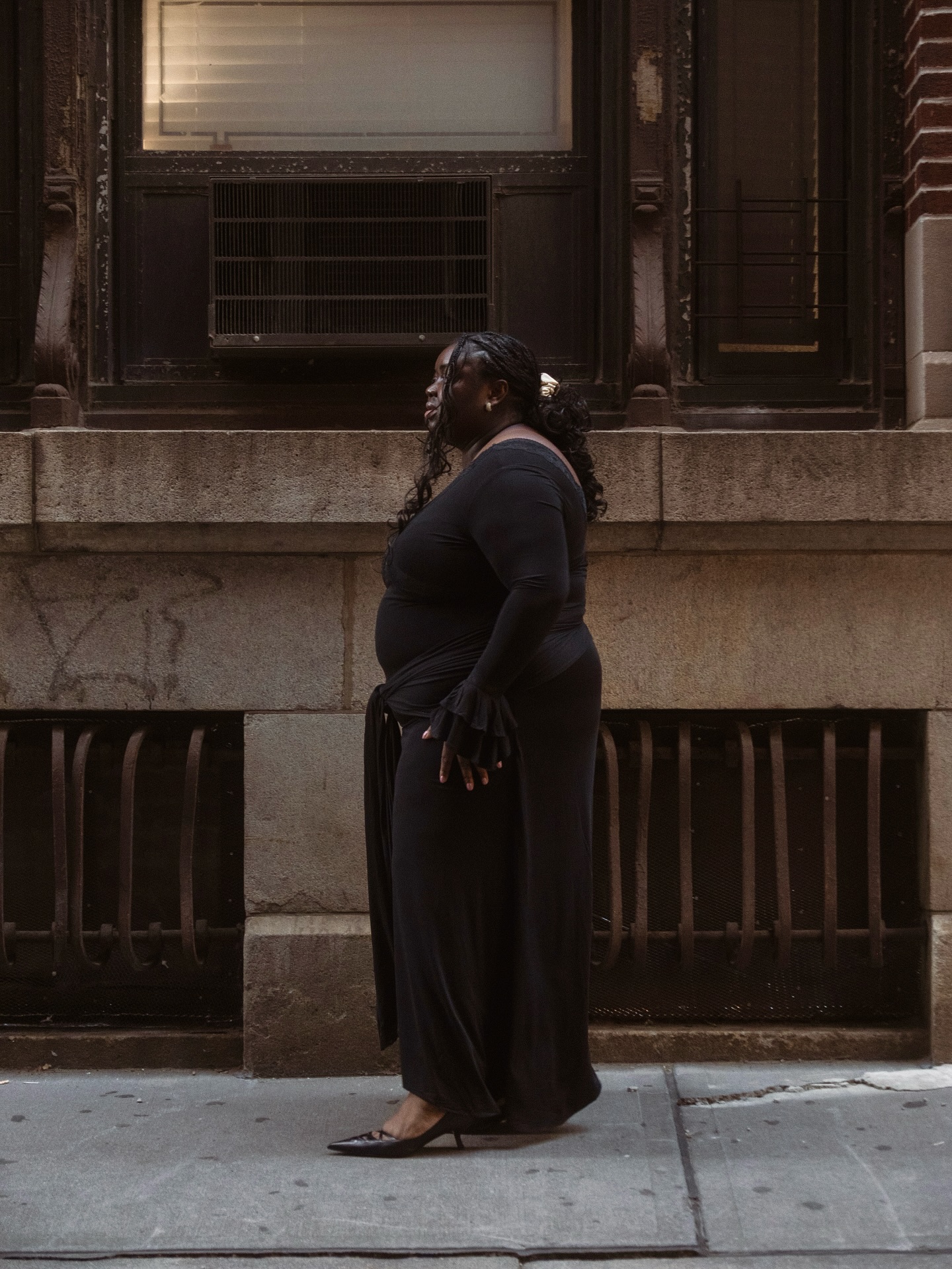 An image of @abimarvel wearing a little black dress, an example of what to wear to a cocktail bar.