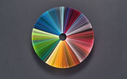 Colorful Pie Chart Consists of Paper Pages on Deep Grey Background.